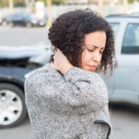 woman experiencing car accident symptoms