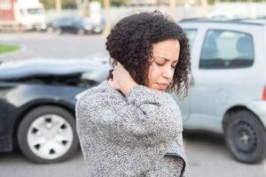 woman experiencing car accident symptoms
